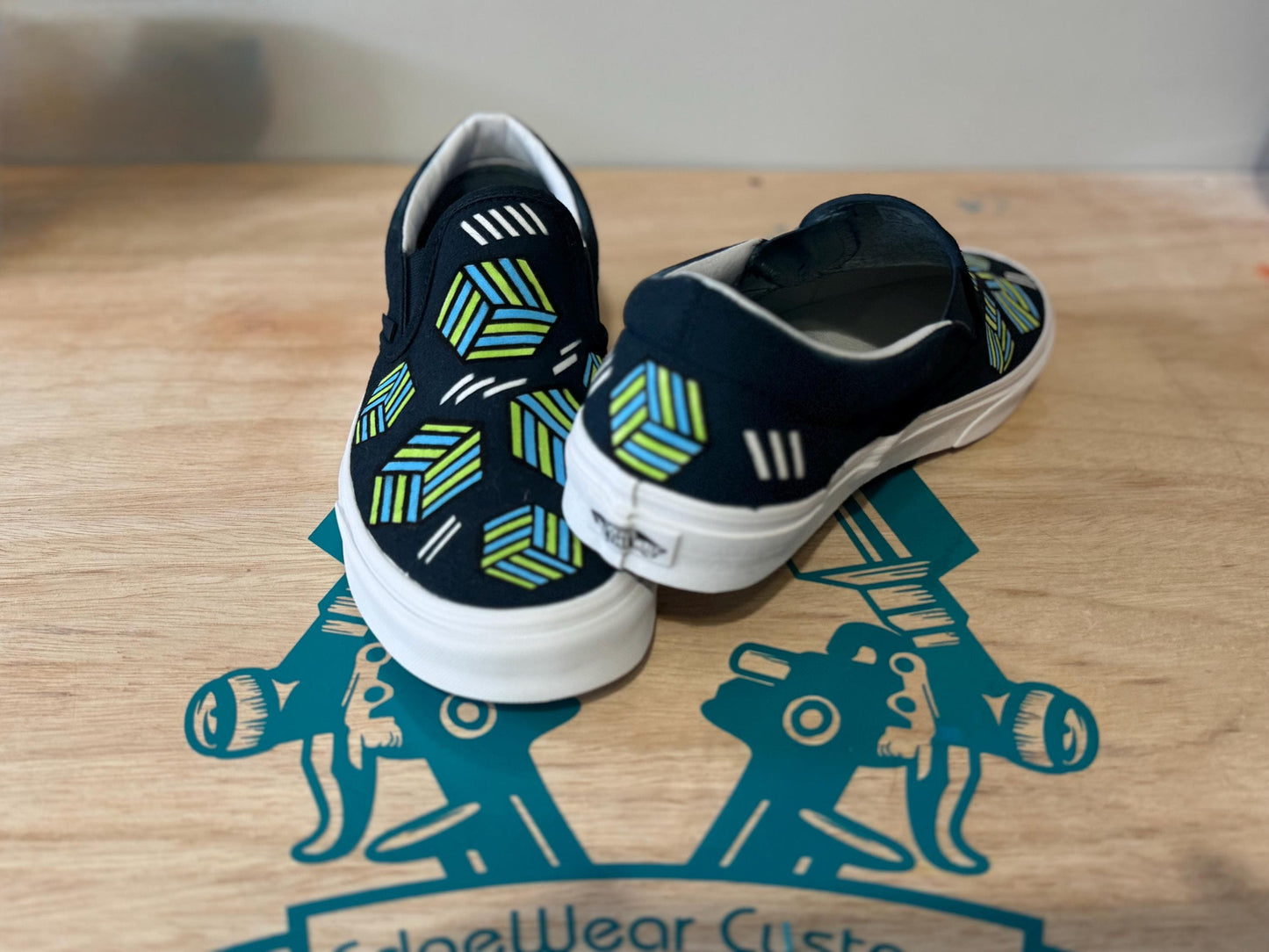 Hand-Painted Geometric Slip-On Sneakers – Modern Cube Pattern in Green & Blue