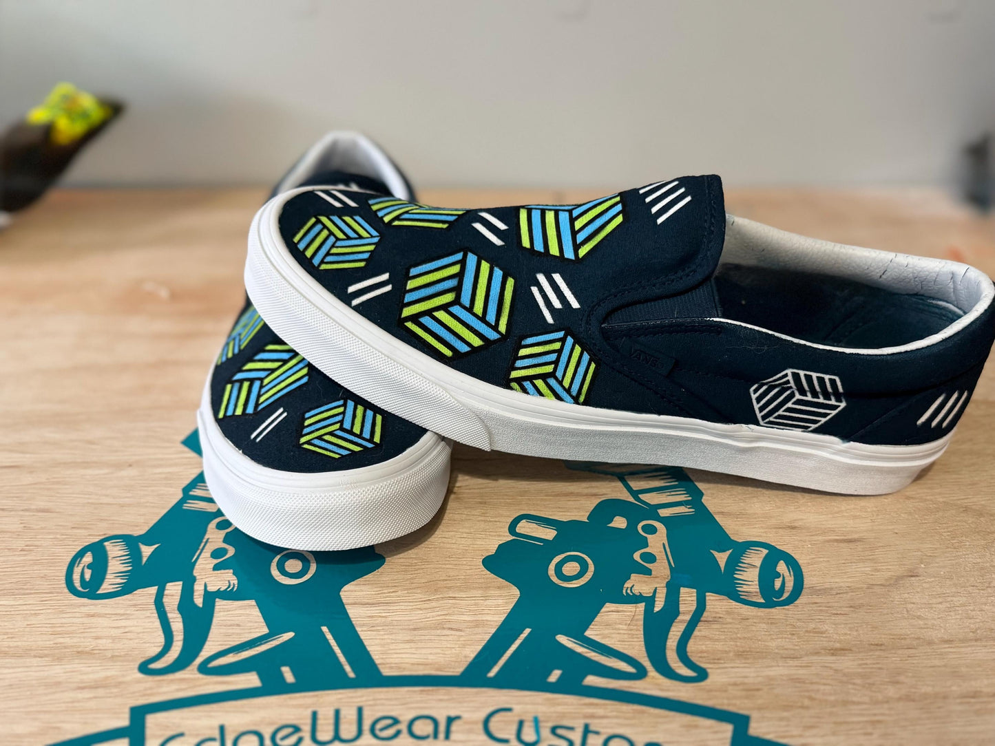 Hand-Painted Geometric Slip-On Sneakers – Modern Cube Pattern in Green & Blue