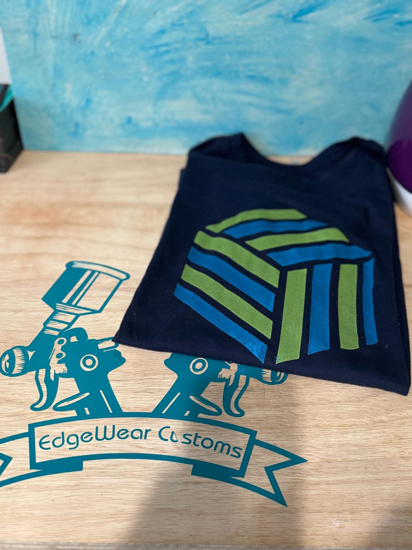 Geometric Striped Cube T-Shirt – Blue and Green on Navy Blue | Modern Optical Illusion Design | Unisex Fit