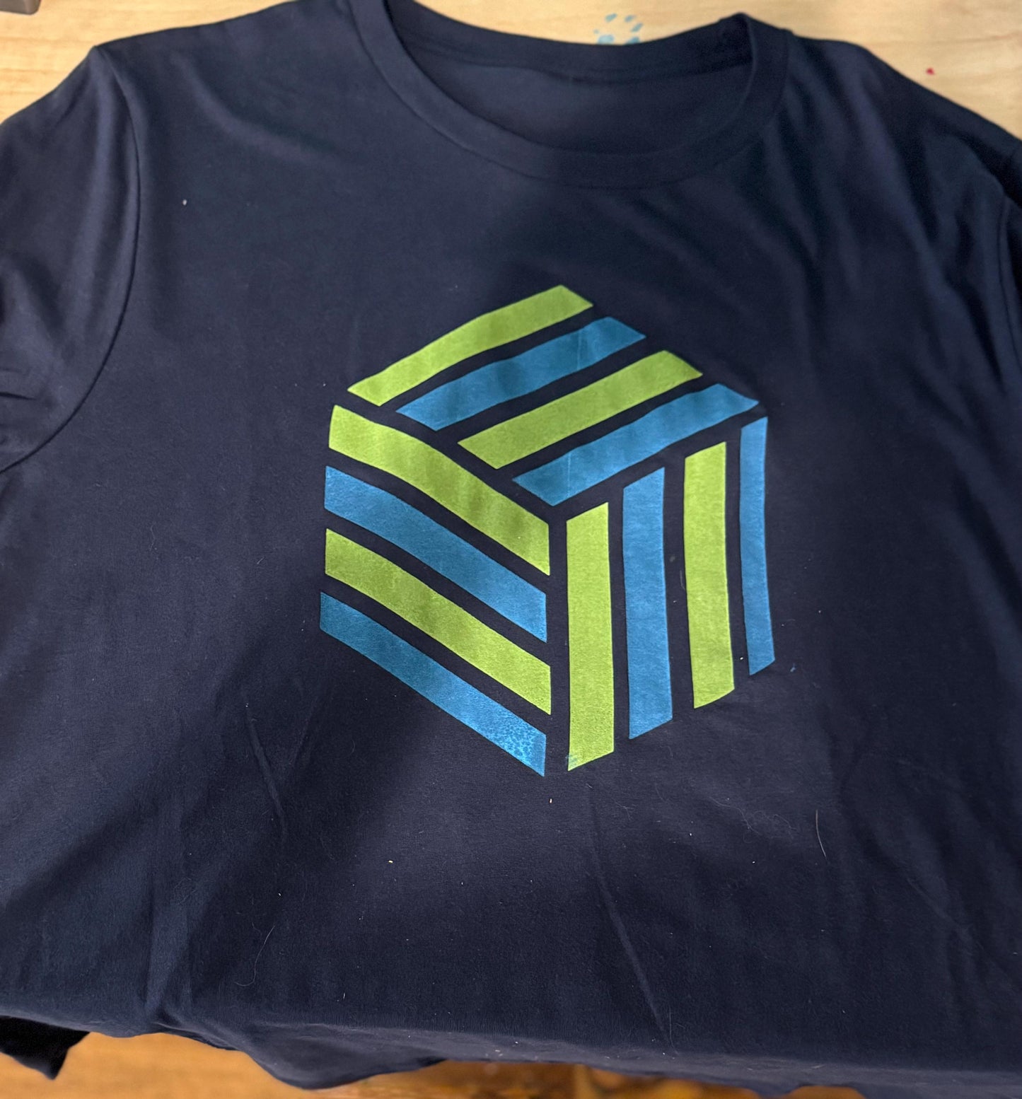 Geometric Striped Cube T-Shirt – Blue and Green on Navy Blue | Modern Optical Illusion Design | Unisex Fit